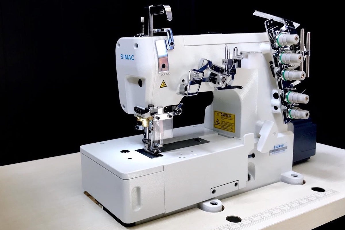SIMAC 562 | Macchina a punto copertura base piana 3 aghi 5 fili con motore integrato